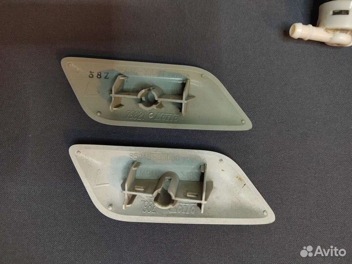 Омыватель фары Камри 50 с 11-14г. Левый