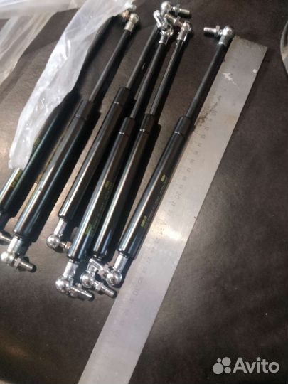 Газовый упор дверей,капота трактора агромаш 50ТК