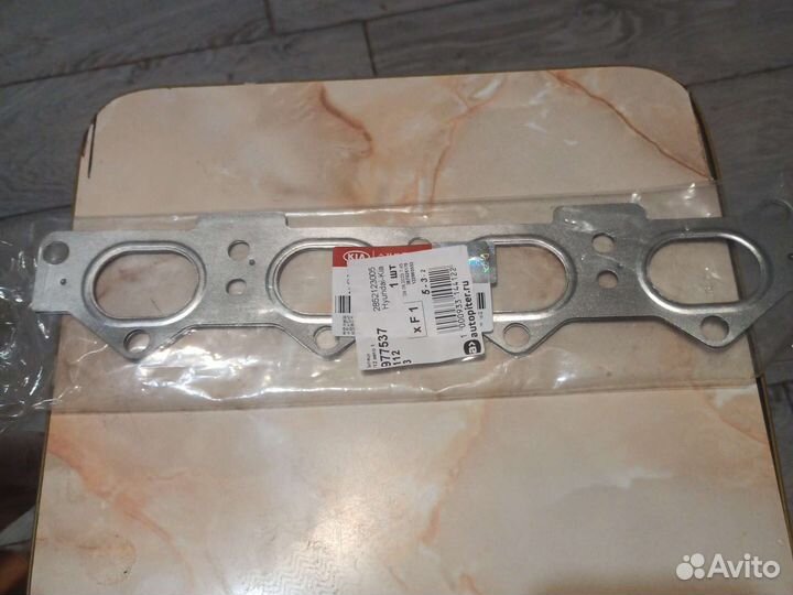 Прокладка выпускного коллектора Киа Спектра