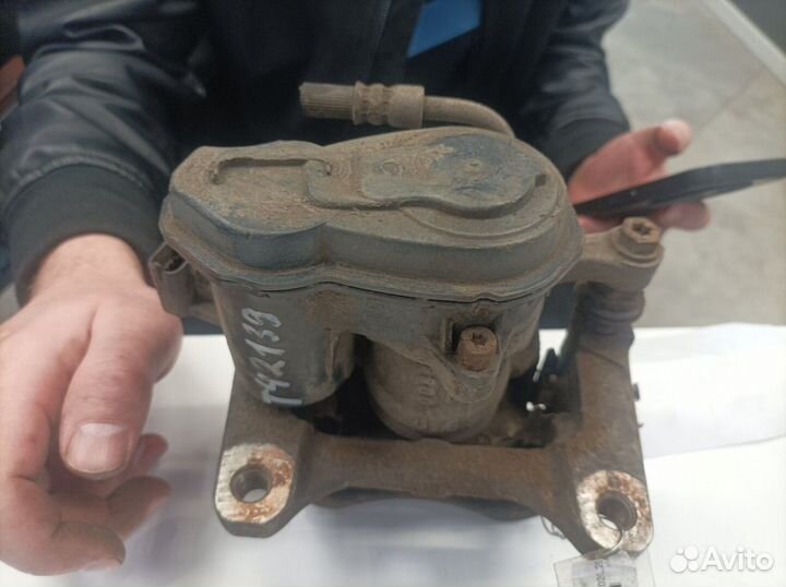 Суппорт левый задний Opel Insignia