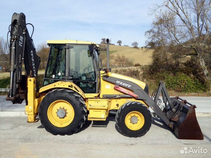 Аренда экскаватора погрузчика. Трактор. Гидромолот