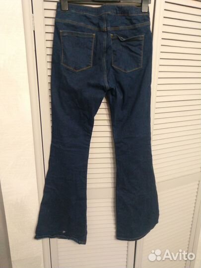 Джинсы клеш