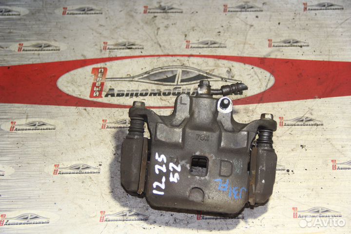 Суппорт перед лево c Nissan Teana J31 VQ23DE