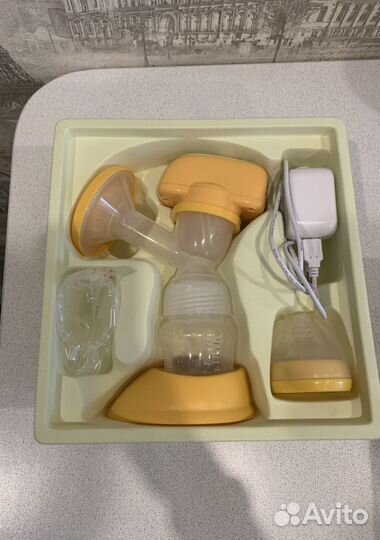 Электрический молокоотсос Maman