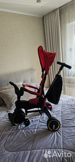 Детский трехколесный велосипед складной doona