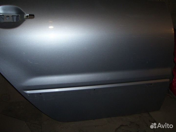 Митсубиси ланцер 9 дверь задняя