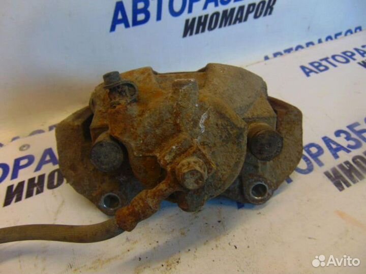 Суппорт тормозной передний левый Opel Astra H