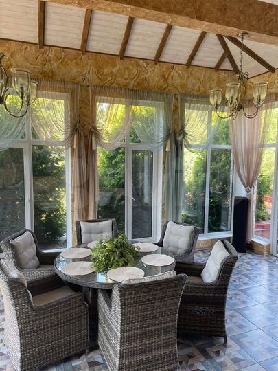 Коттедж 307 м² на участке 18 сот.