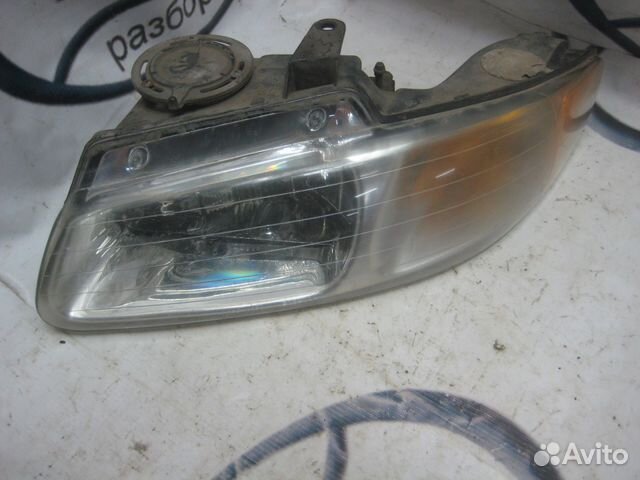 Фара левая Crysler Voyager