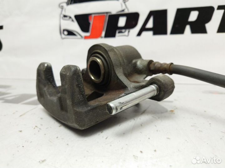 Суппорт тормозной задний Mitsubishi Outlander II