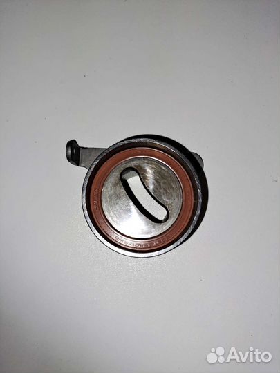 Ролик натяжной ремня грм Toyota Corolla