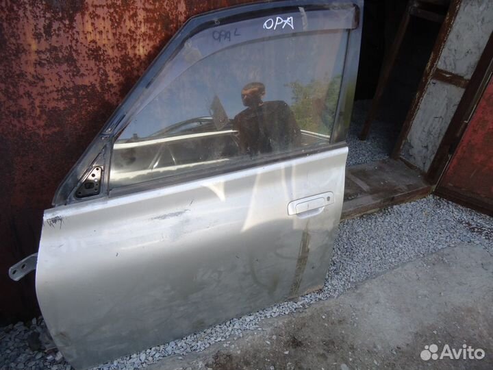 Дверь левая передняя toyota opa