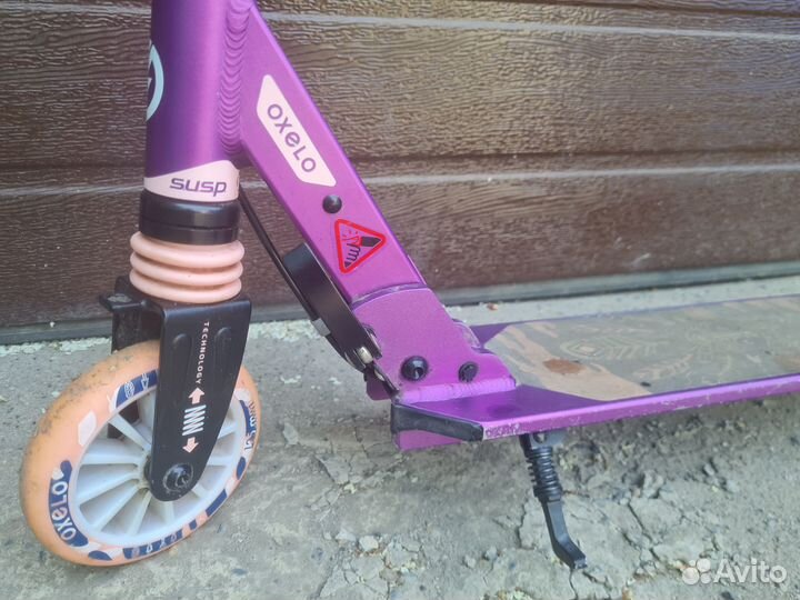 Самокат с ручным тормозом и подножкойй