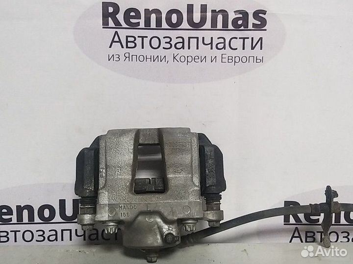 Тормозной суппорт задний Kia Optima 3