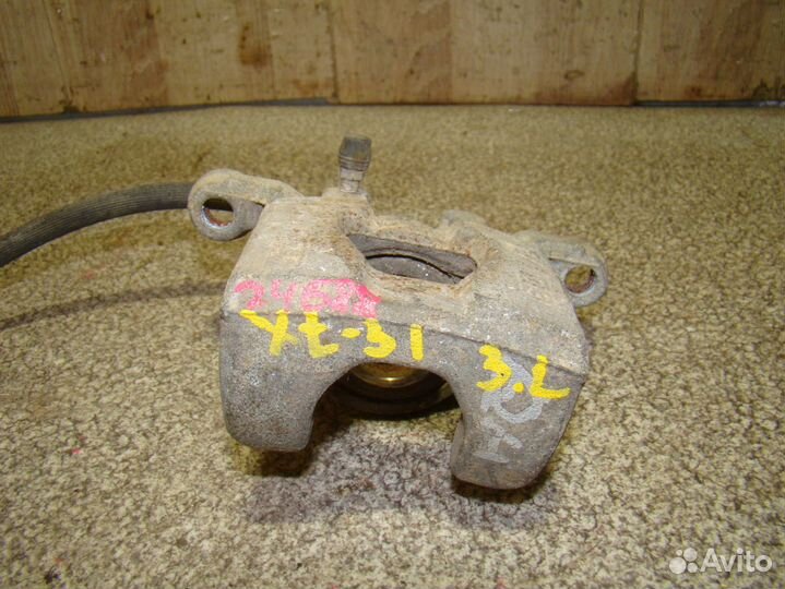 Суппорт задний левый Nissan X-Trail (T31)