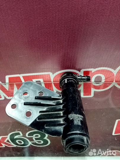 Форсунка омывателя фары передняя Kia Sportage