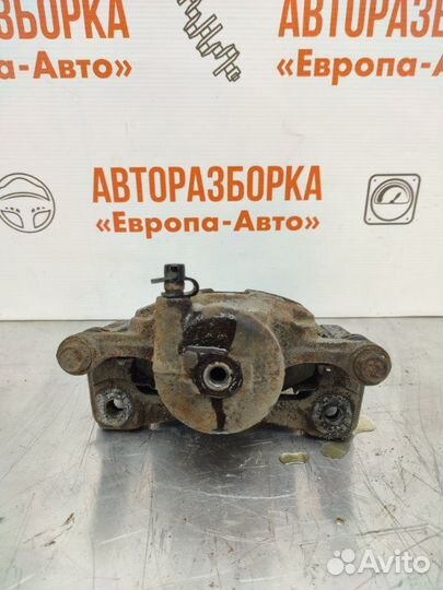 Суппорт тормозной передний левый Chevrolet Aveo