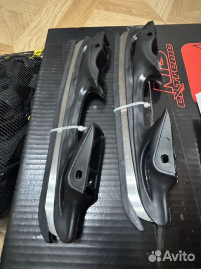 Роликовые коньки