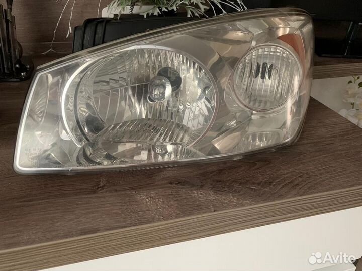 Фара KIA Cerato 1 левая Оригинальная