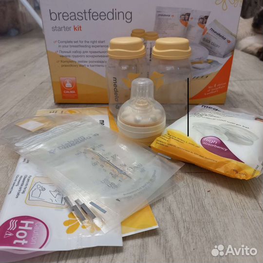 Молокоотсос medela ручной,бутылочки, соска