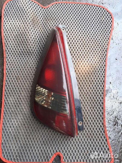 Задний левый фонарь Suzuki liana