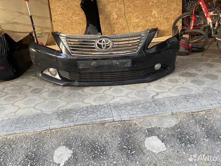 Бампера, молдинги капот, багажник. Camru v50