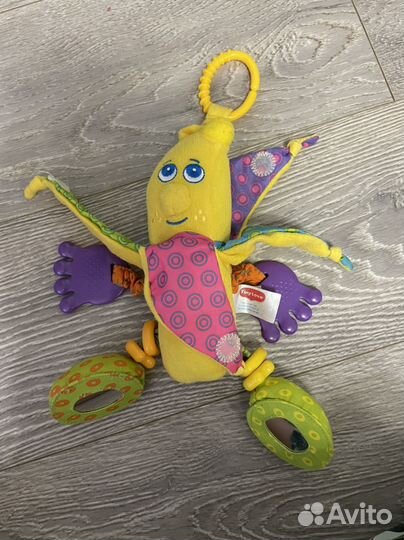 Развивающие игрушки погремушки Tiny love