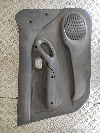 Обшивка двери передней левой Hyundai Accent 1994-2