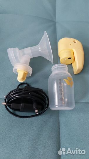Молокоотсос medela электрический