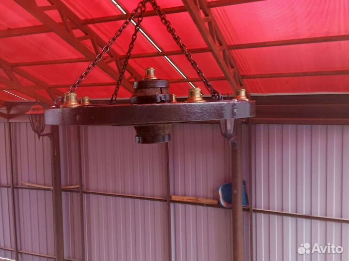 Люстра, светильник.из колеса старинной телеги