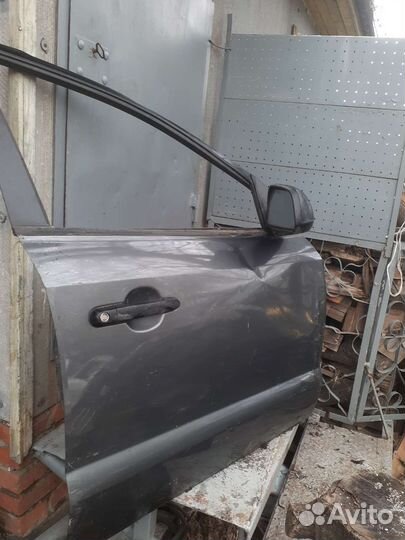 Передняя правая дверь Hyundai Tucson 1