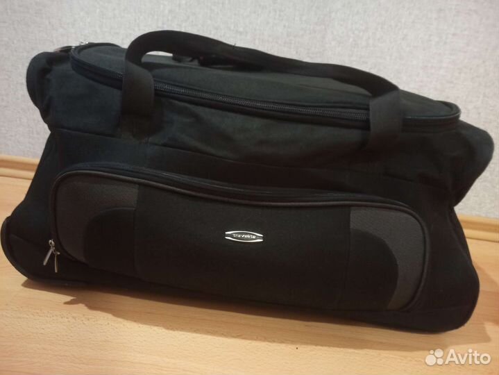 Сумка дорожная на колесах с выдвижной ручкой