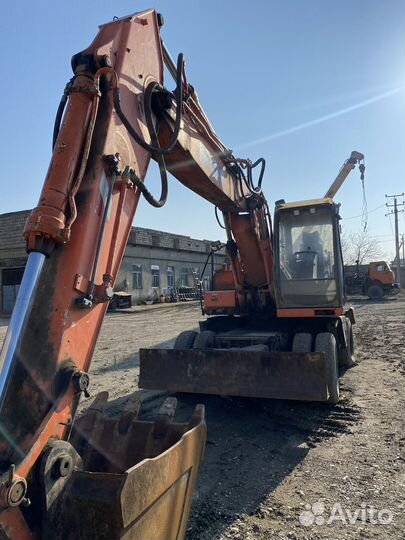 Колёсный экскаватор Hitachi EX165W, 2002