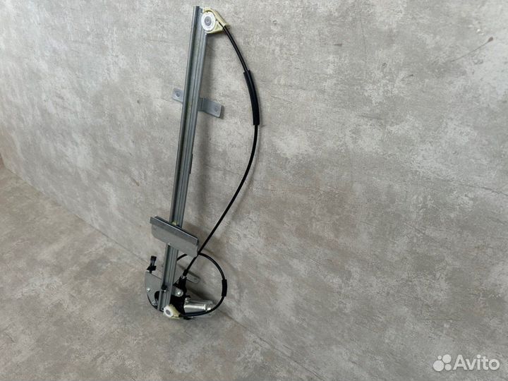 Стеклоподъемник левый Renault Magnum