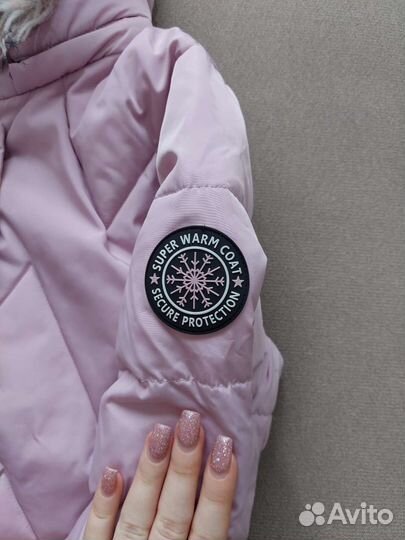 Зимний пуховик на девочку нежно розового оттенка