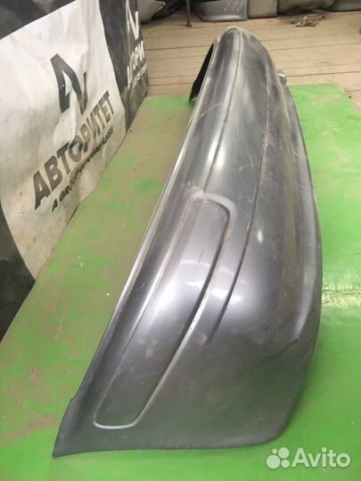 Бампер задний Nissan March K11