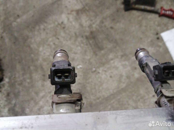 Форсунка Opel Corsa D 1.2-1.4 a12xer