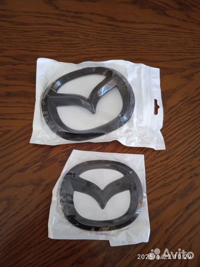 Эмблема mazda