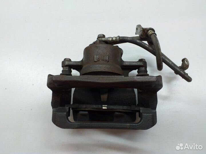 Суппорт тормозной передний правый Toyota Rav4 XA40