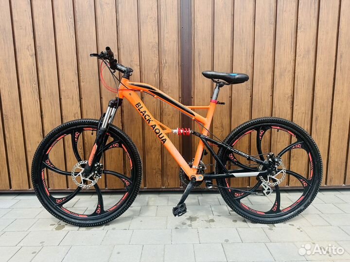 Велосипед на литых дисках двухподвес