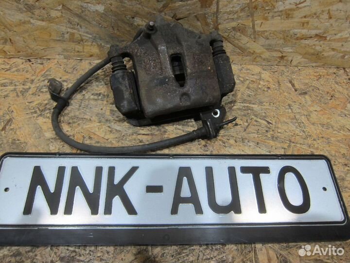 Суппорт тормозной передний Kia Sportage 3