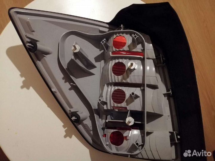 Задний фонарь opel astra h универсал