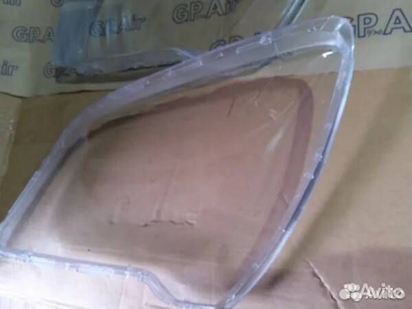 Стекло фары Kia Sportage II Рестайлинг