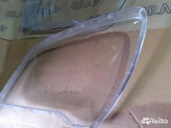 Стекло фары Kia Sportage II Рестайлинг