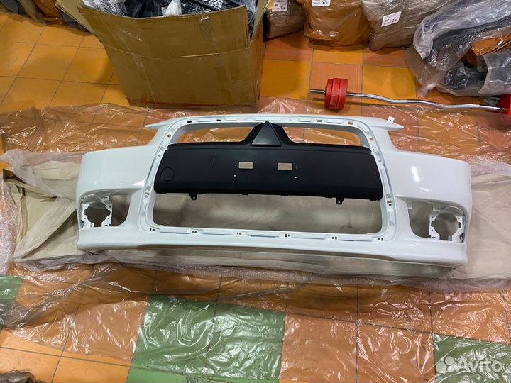 Бампер Mitsubishi Lancer 10 рестайлинг белый