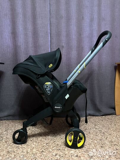 Коляска автолюлька doona