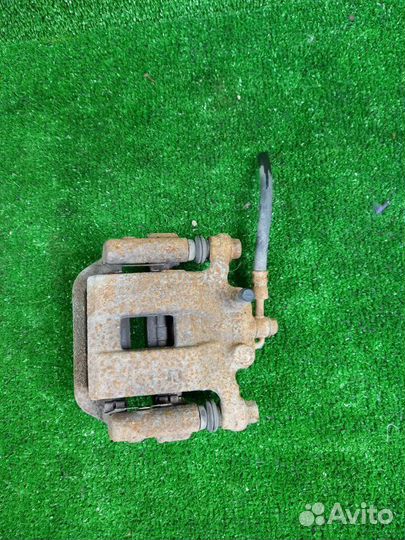 Суппорт тормозной задний Nissan X-Trail Т31 MR20DE