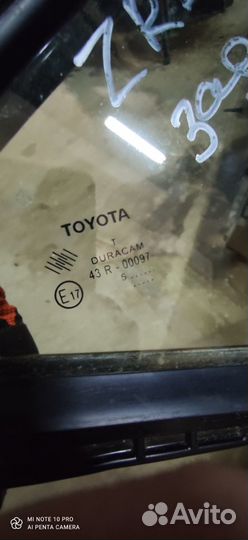 Стекло задней правой двери Toyota Corolla ZRE180