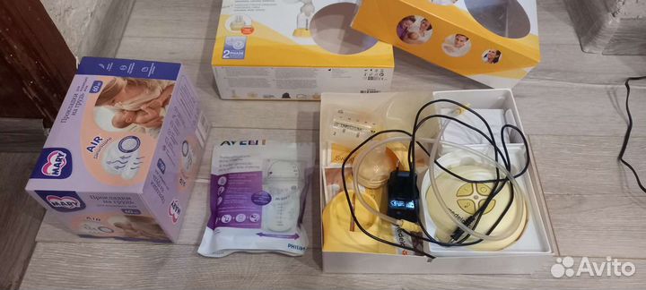 Молокоотсос medela электрический