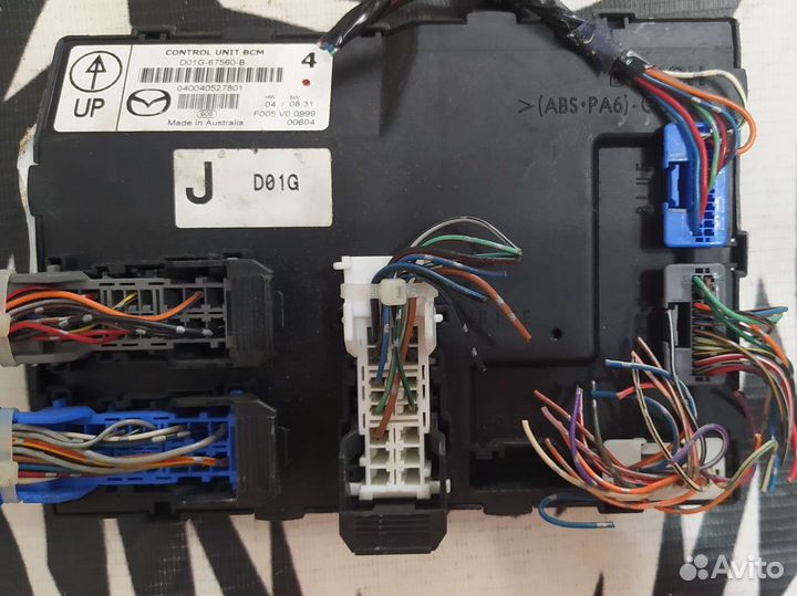 Блок комфорта для Mazda Demio D01G67560B